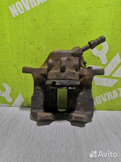 Суппорт передний правый Фольксваген Гольф 3 Венто