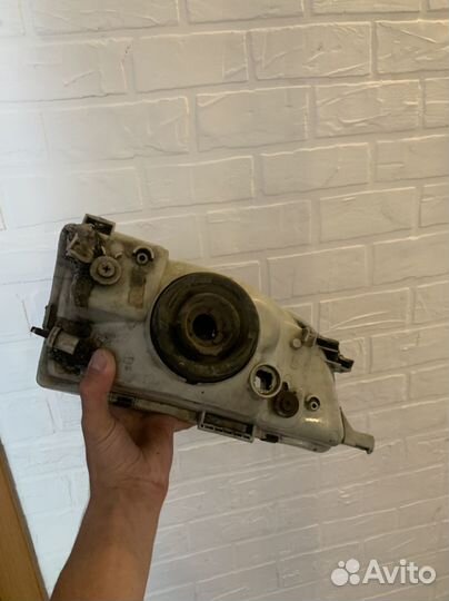 Фара левая toyota corolla ae100