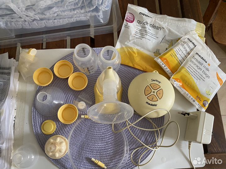 Молокоотсос medela электрический