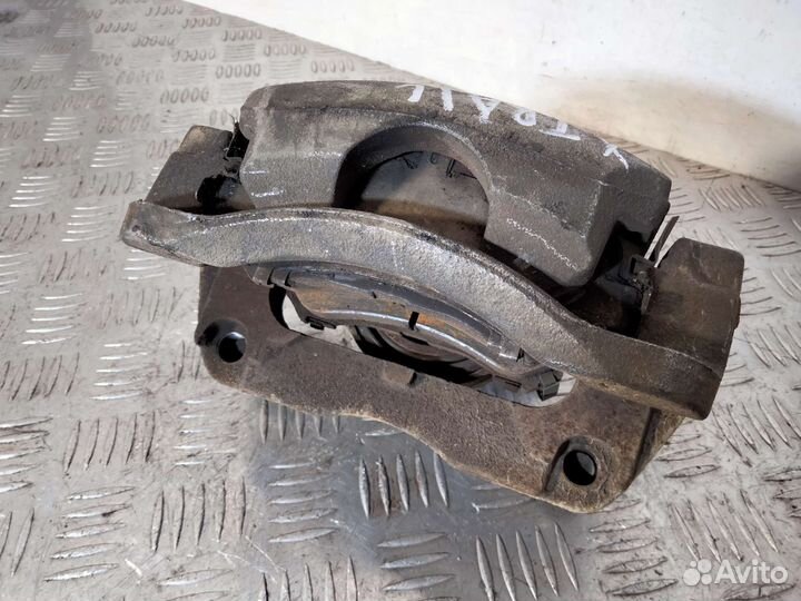 Суппорт передний левый Nissan x-trail t31