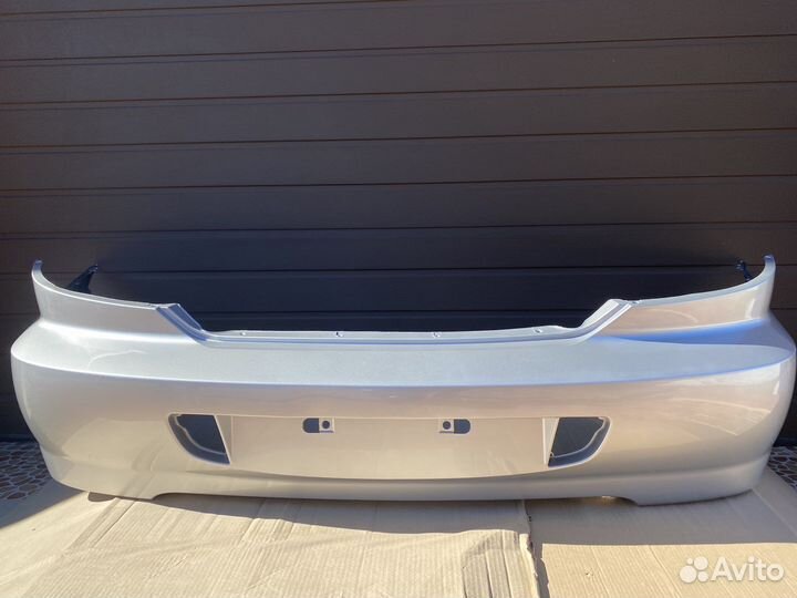 Бампер задний Kia Spectra