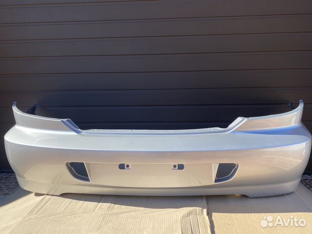 Бампер задний Kia Spectra