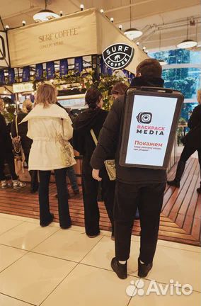 Наружная реклама на рюкзаках Backpack Media