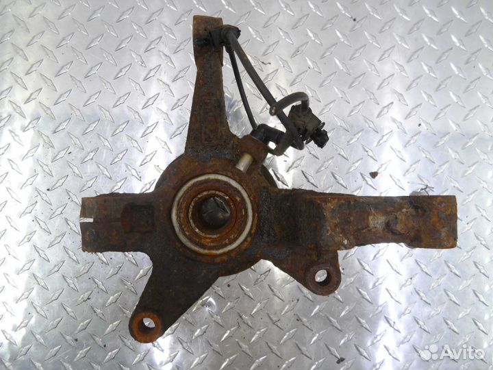 Кулак поворотный левый Mazda CX-7 ER