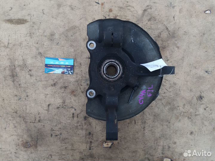 Кулак поворотный левый Мицубиси Лансер X