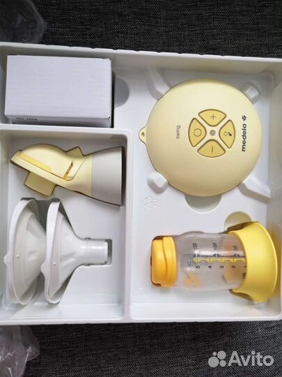 Молокоотсос medela электрический