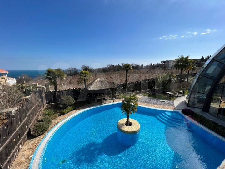 Дом 550 м² на участке 12,7 сот.