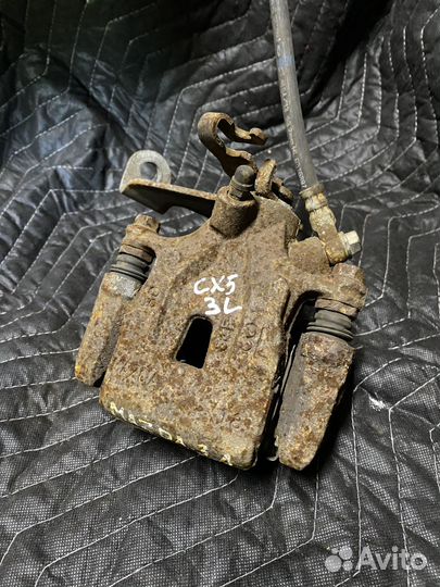 Суппорт задний левый Mazda CX-5 11-17г