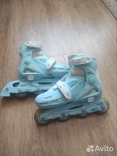 Роликовые коньки