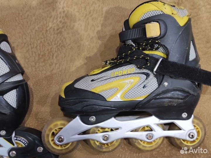 Роликовые коньки