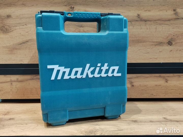 Аккумуляторная дрель-шуруповерт Makita DF488DWE (1