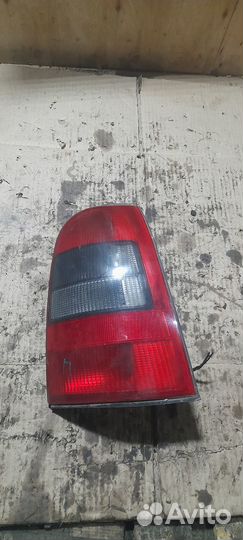 Фонарь задний правый вектра б