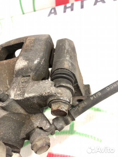 Суппорт тормозной задний левый Mitsubishi