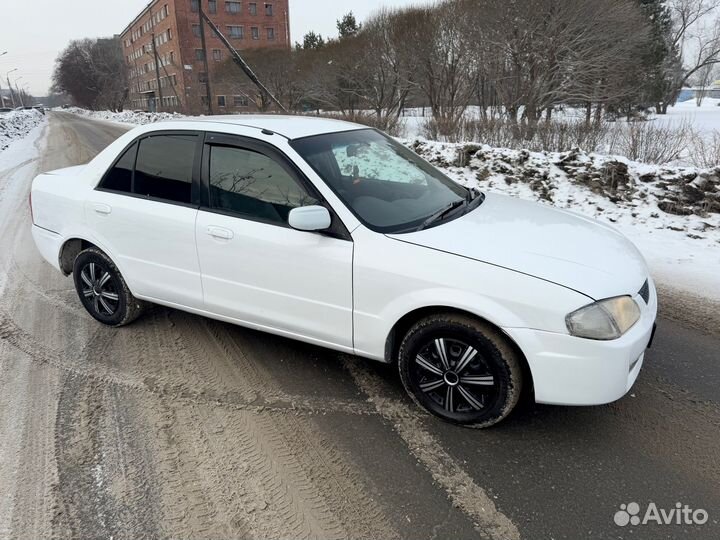 Mazda Familia 1.3 AT, 1999, 329 000 км