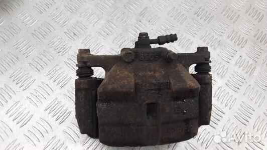 Суппорт тормозной передний левый nissan qashqai J1