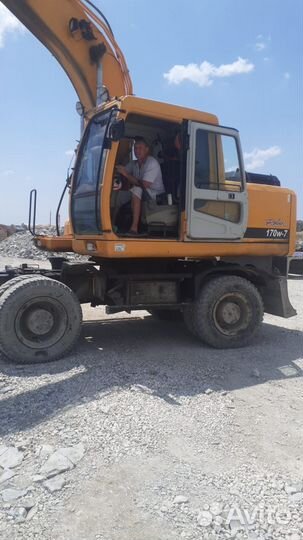 Машинист колесного экскаватора Hyundai R200