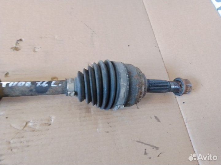 Полуось привод передний левый Nissan Tiida 1.6