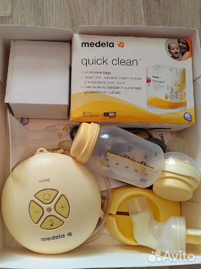 Молокоотсос medela электрический