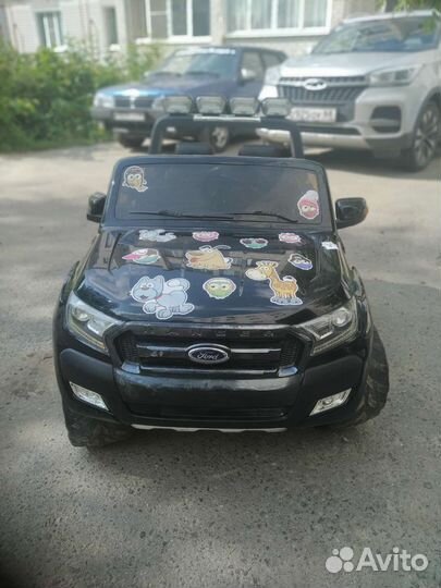 Детский электромобиль двухместный