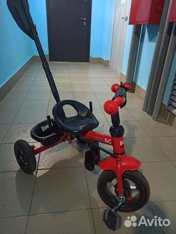 Трехколесный велосипед с ручкой