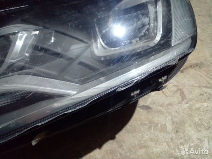Фара левая Volkswagen Tuareg NF дефект