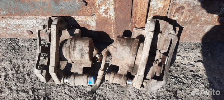 Суппорт тормозной Ford Escort