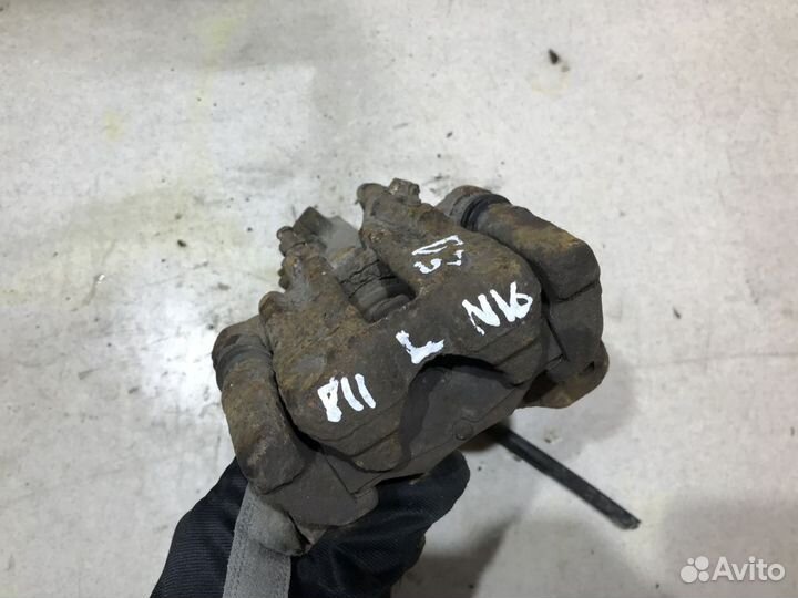 440112F500 Суппорт левый Nissan Almera N16