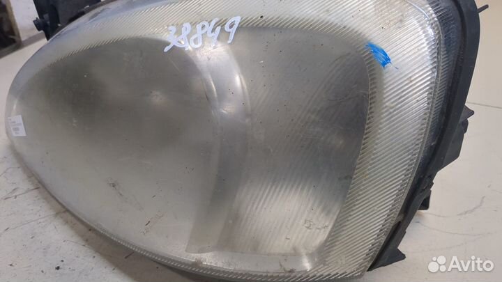 Фара (передняя) левая Opel Corsa C