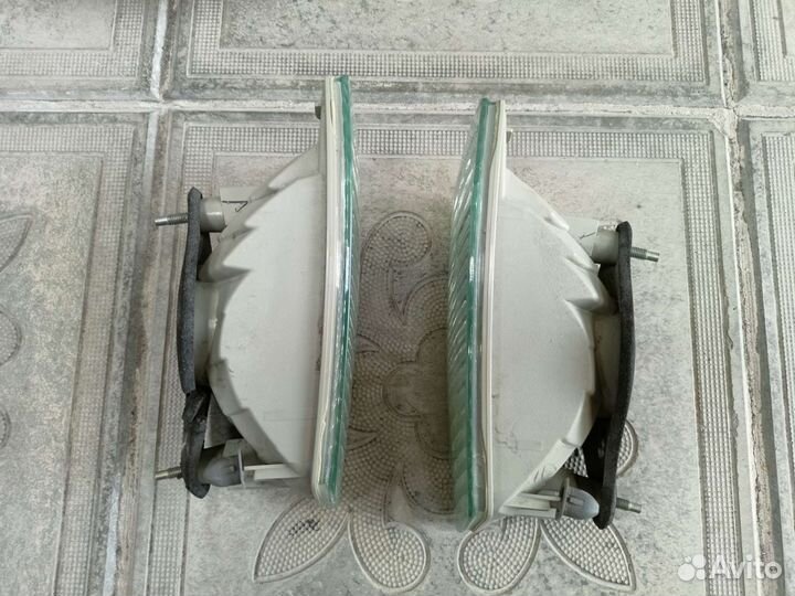 Фонарь заднего хода на Toyota Corolla Fielder E120