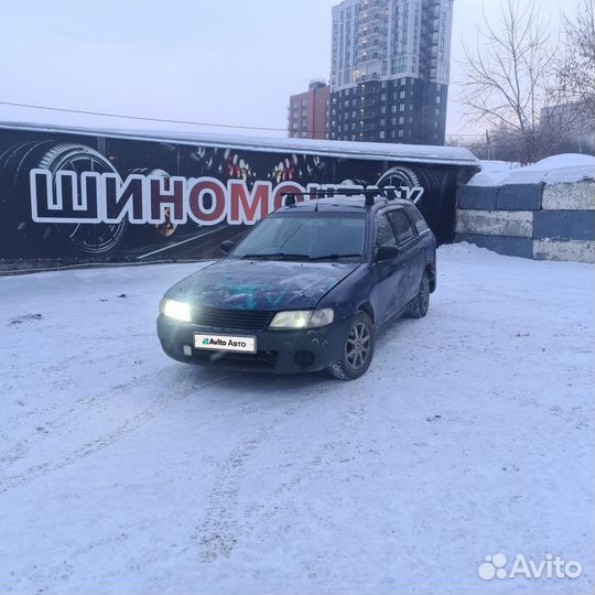 Mazda Familia 1.3 AT, 2001, 150 000 км