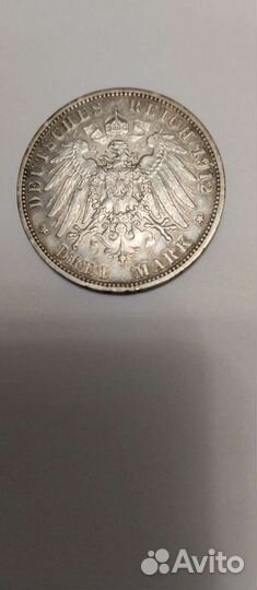 Монета серебро