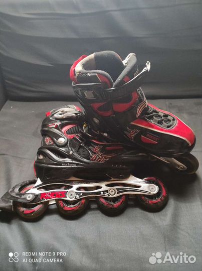 Роликовые коньки