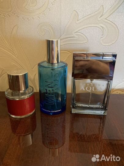 Пустые флаконы от духов Carolina Herrera