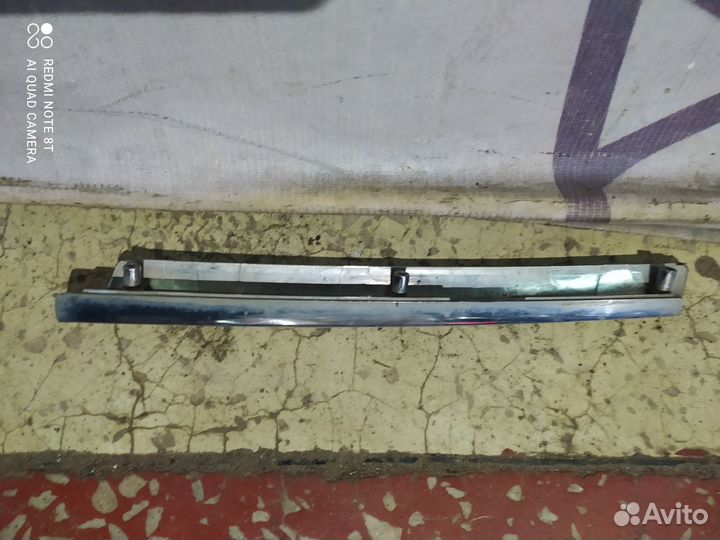 Молдинг решётки радиатора левый KIA Sportage 2