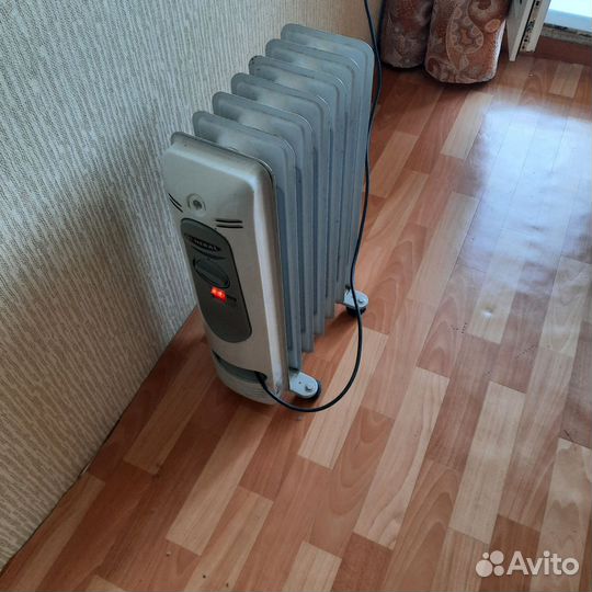 Масляный обогреватель