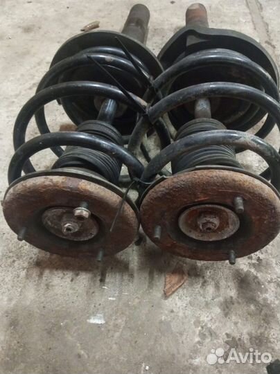 Стойки в сборе перед BMW 7, e38