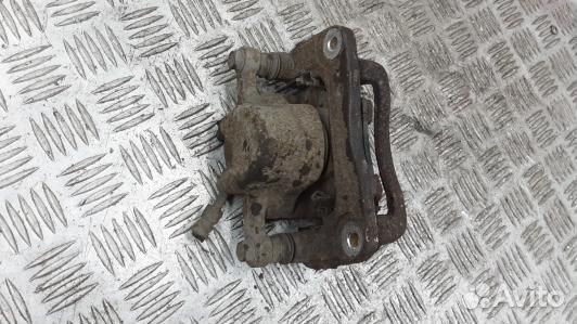 Суппорт тормозной задний левый KIA sorento 2 (XKR0