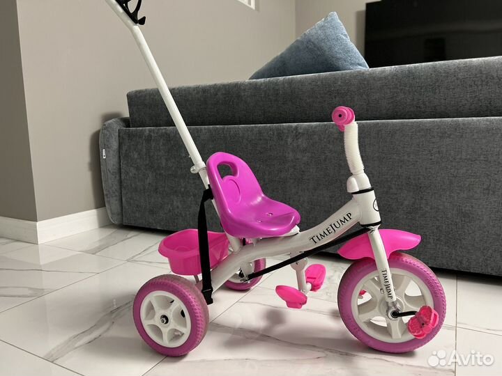 Трехколесный велосипед розовый