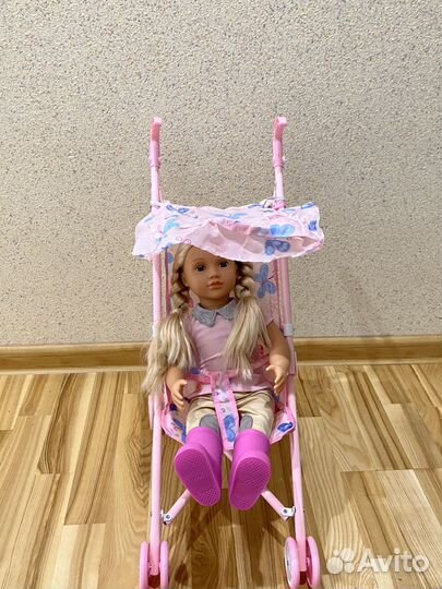 Игрушечная коляска для кукол