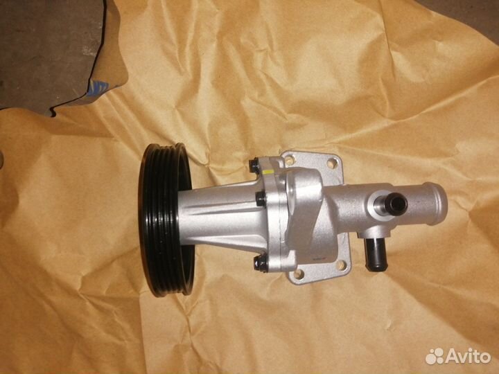 Насос водяной(помпа) оригинал GM Aveo 25188341