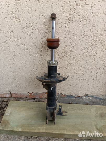 Амортизатор передний Опель Астра h