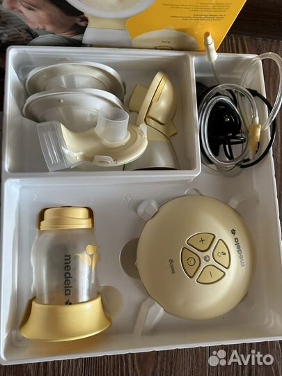 Молокоотсос medela swing flex электрический