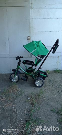 Трехколесный велосипед с ручкой