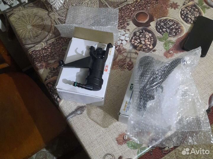 Омыватель фары Nissan Tiida