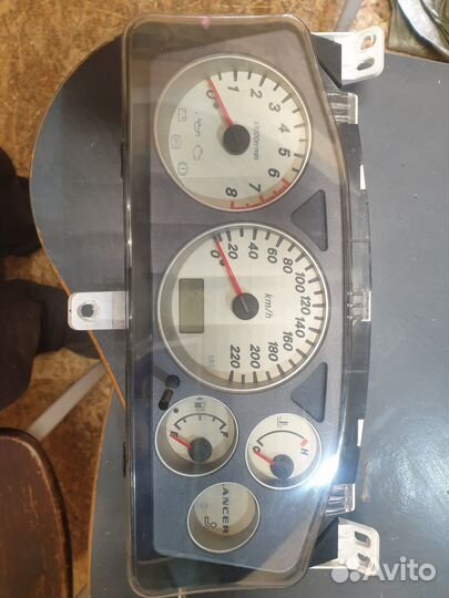 Панель приборов Mitsubishi Lancer 9