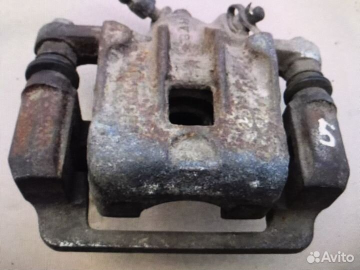 Суппорт тормозной задний правый Hyundai Elantra HD