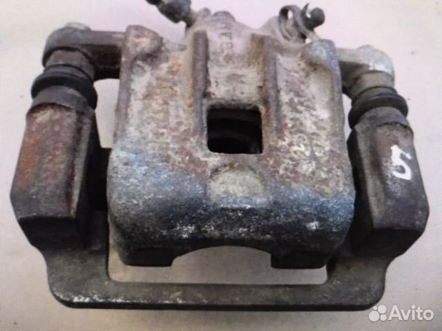 Суппорт тормозной задний правый Hyundai Elantra HD