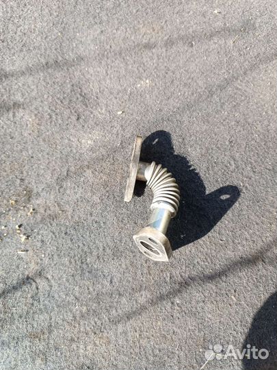 Трубка слива масла с турбины Опель Астра h