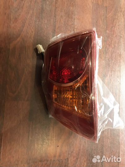 Фонарь задний левый mitsubishi 10 lancer новый