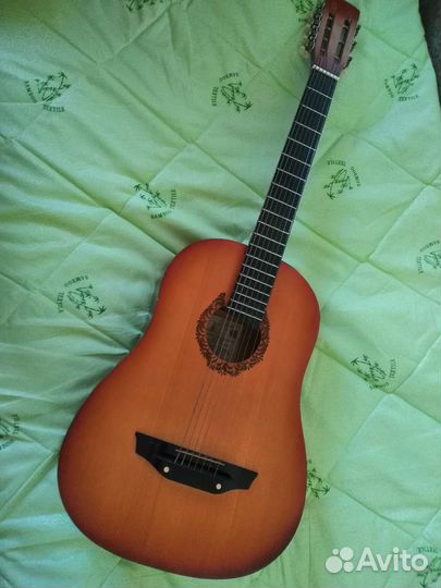 Акустическая гитара